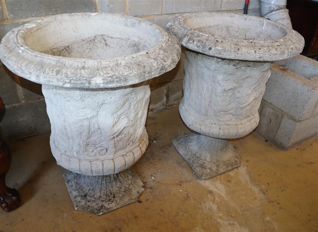 A pair of reconstituted stone Campana garden urns, 62cm diameter, H.80cm